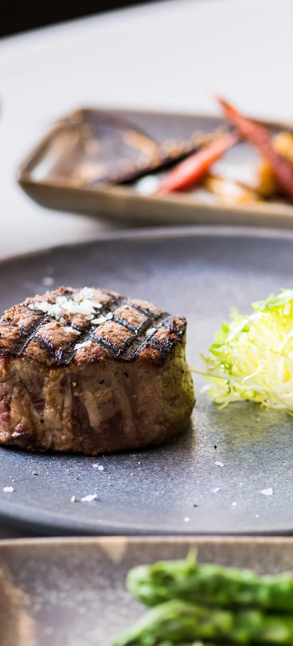 Plate with steak and salad on it