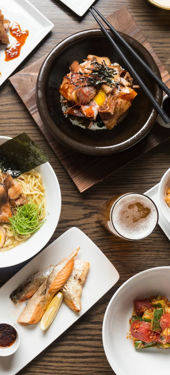 Plates of food and drinks on a table