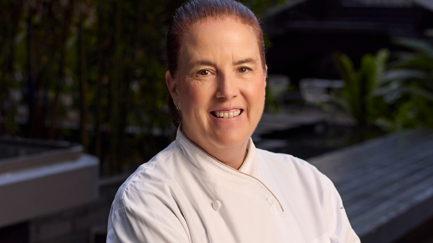 A woman in a chef coat