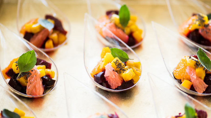 Teardrop shaped serving bowls with fresh fruit inside