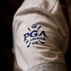 Chef coat with the PGA of America logo embroidered on the sleeve