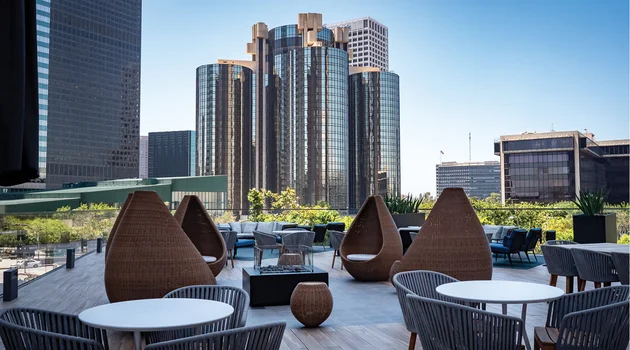 Modern rooftop lounge with city view