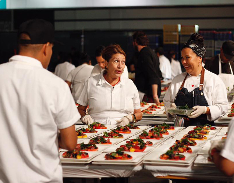 catering staff plating food