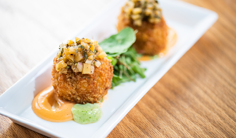 Crab cakes served at Tangata Restaurant in Orange County