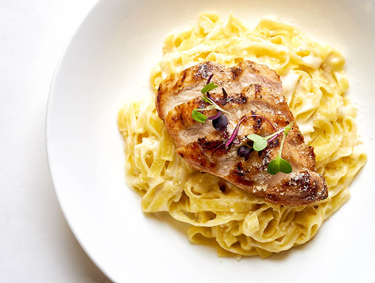 Fresh pasta with grilled chicken | Italian Dining Walt Disney World