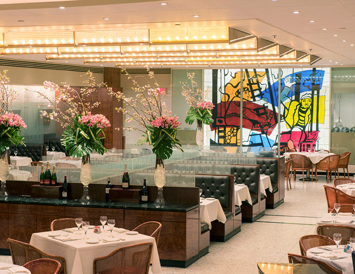 Dining area inside Brasserie 8 1/2 in midtown NYC