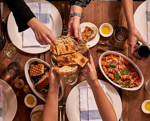 Various people having a meal together