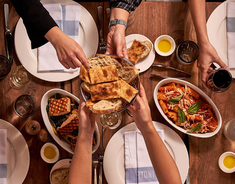 Various people having a meal together