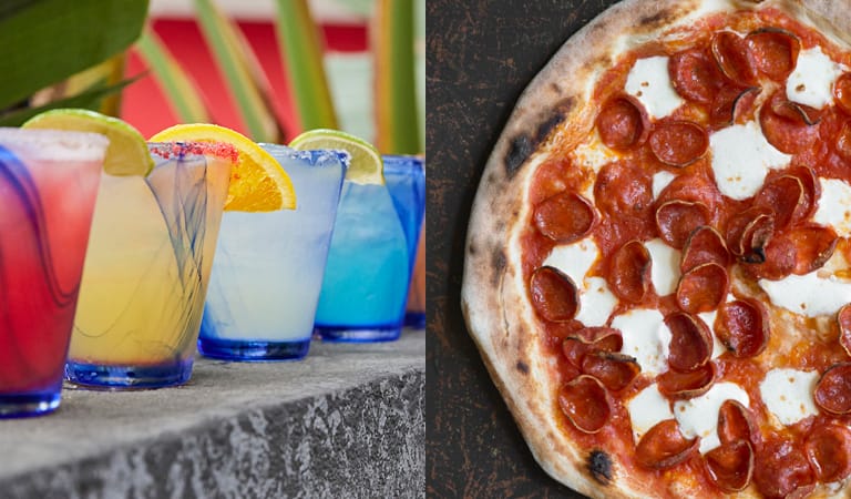 drinks lined up on a stone ledge and a overhead view of a pizza