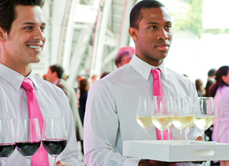 Waiters with wine